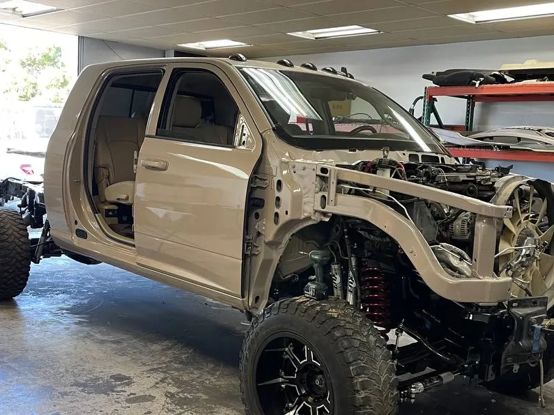 Pickup truck stripped down for major collision and frame repair